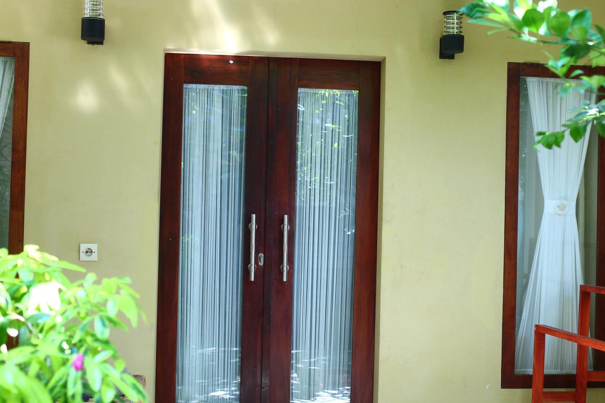 Three V Homestay Kuta  Экстерьер фото
